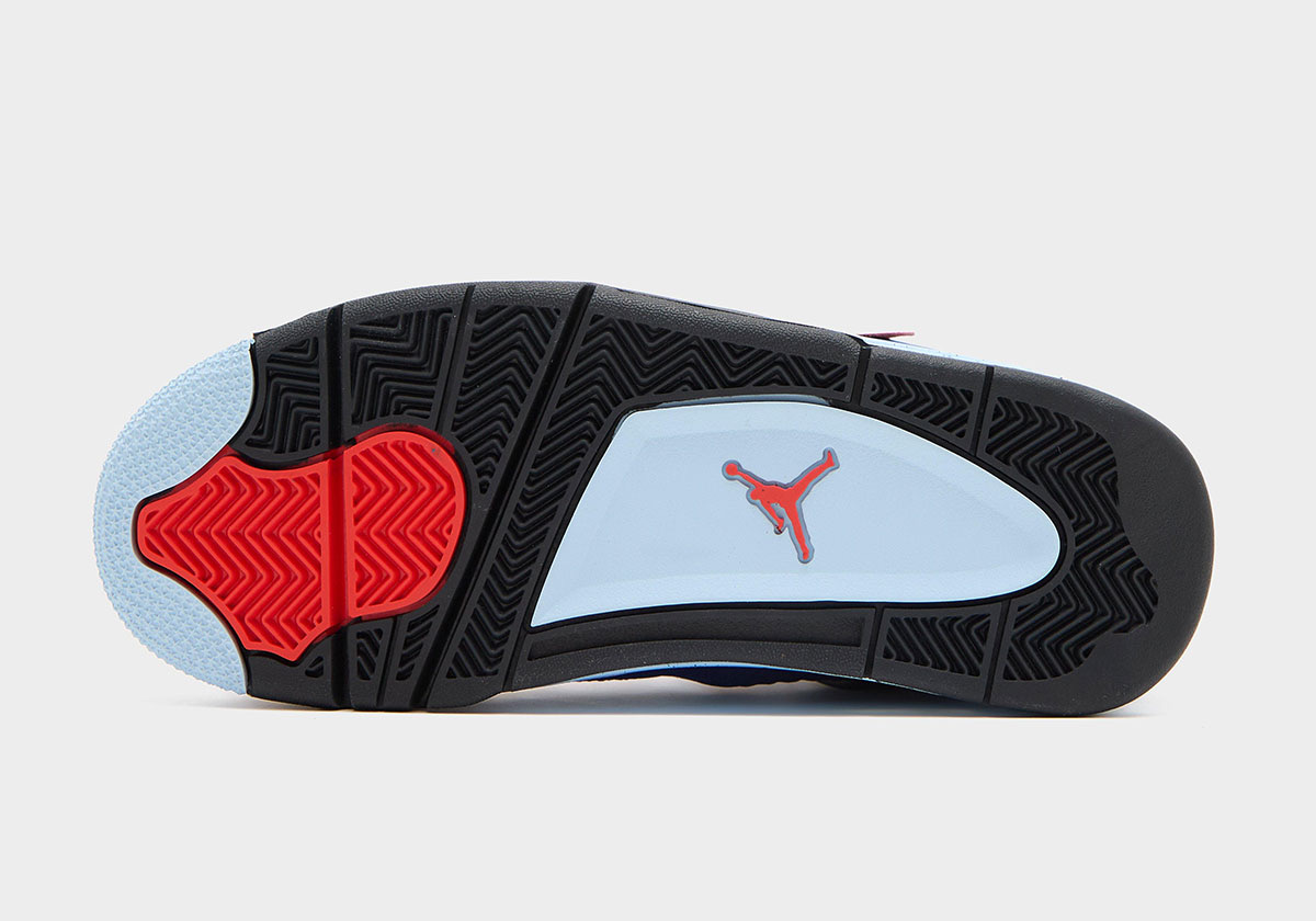 Suela del Air Jordan 4 Deep Royal Blue sobre fondo gris claro, en negro y celeste con el Jumpman rojo en el centro