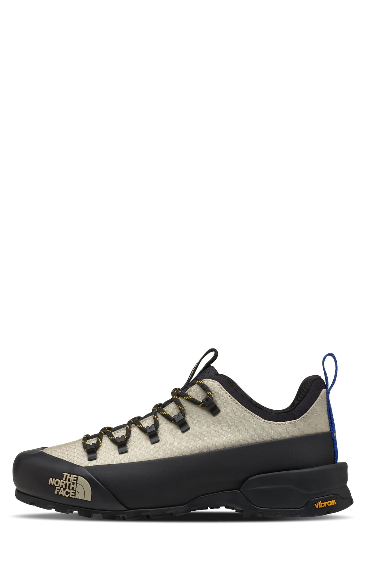 Zapatilla The North Face Glenclyffe Low beige con base negra, cordones negros y amarillos con ganchos y tira azul en el talón